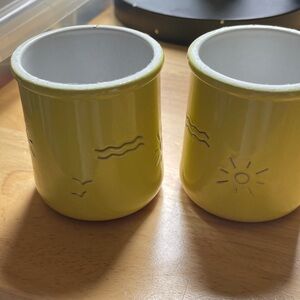 Vibrant Yellow Ceramic Mugs with Sun and Wave Design